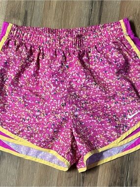 Nike Women's Pink Confetti Running Shorts with Yellow Trim small
